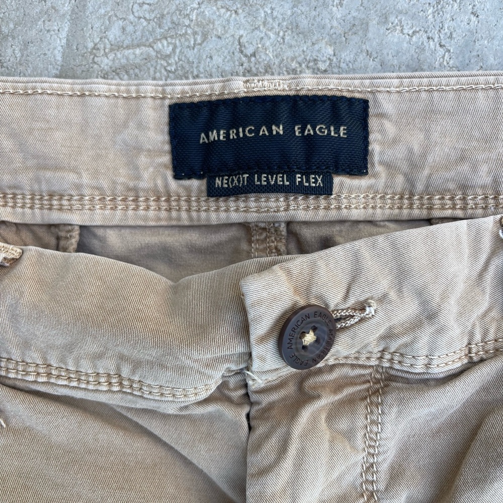 AMERICAN EAGLE NEXT LEVEL FLEX KHAKI. CONDITION IS USED, LIGHTLY. SZ 36x34